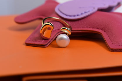 Natural pearl ring with gold size and double petal design with adjustable opening