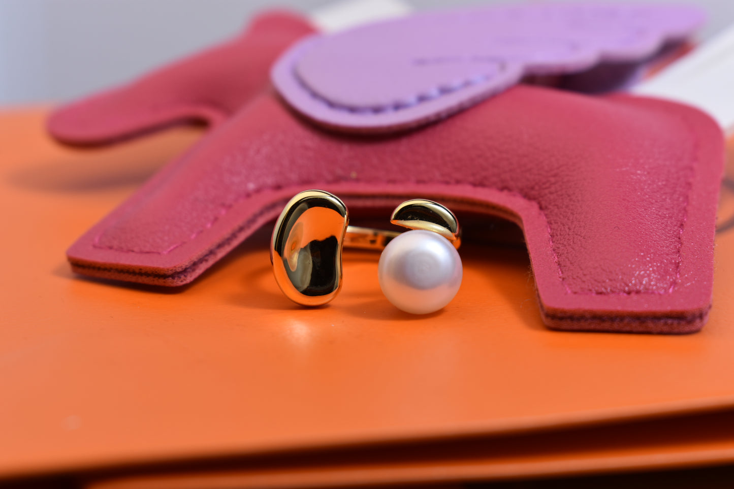 Natural pearl ring with gold size and double petal design with adjustable opening